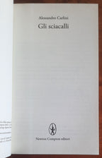Gli sciacalli - di Alessandro Carlini - Newton Compton
