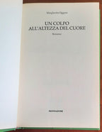 Un colpo all’altezza del cuore - di Margherita Oggero - Mondadori