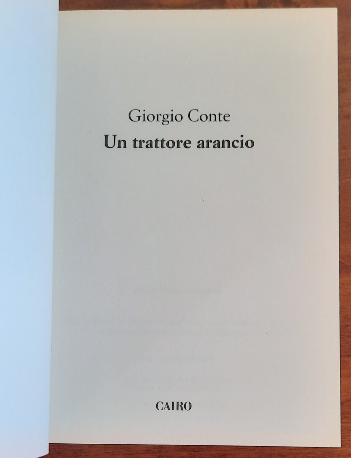 Un trattore arancio - di Giorgio Conte