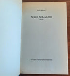 Segni sul muro - Libreria Biellese